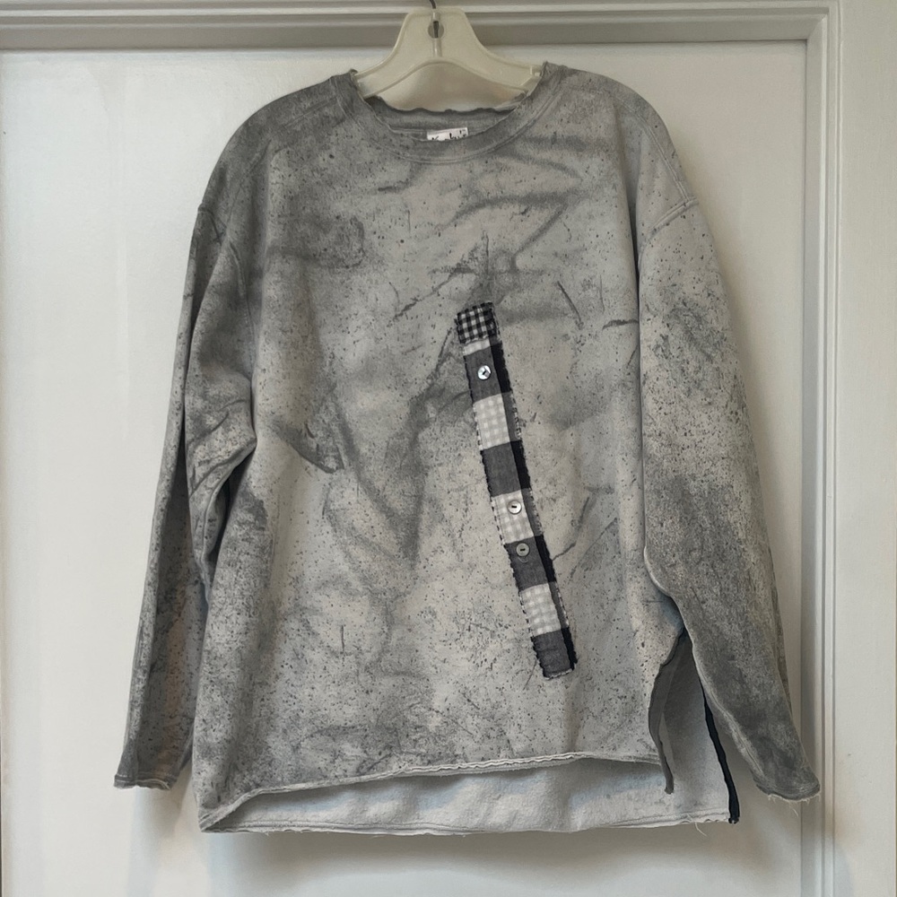 Kunky’s hand-painted sweatshirt